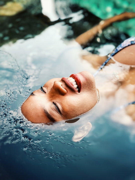 a woman floating in water