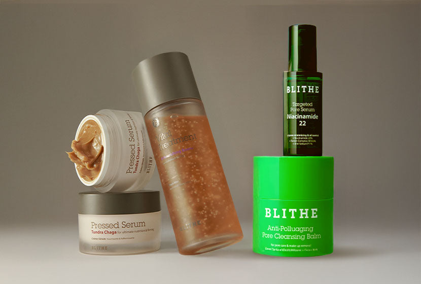 four Blithe Cosmetics skincare products on a beige surface