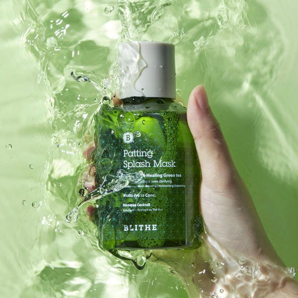 a hand holding Blithe Cosmetics’ Patting Splash Mask underwater