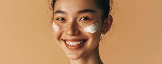 A girl with cream applied on both her cheeks, demonstrating skincare routine for oily skin.