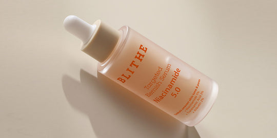 An image showcasing the Blithe Targeted Blemish Serum with Niacinamide 5%, elegantly presented to highlight its sleek packaging and potent formula designed for effective skincare.