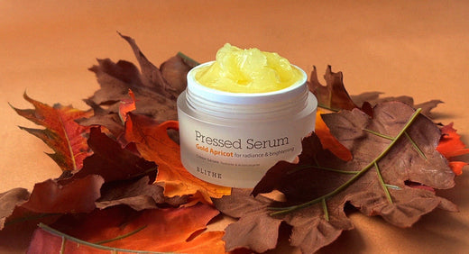 Blithe's Pressed Serum Gold Apricot combines serum and moisturizer, enriched with Beta Carotene and Niacinamide for healing skin. Infused with 31.27% apricot oil extract and natural antioxidants, it brightens and combats blemishes, ideal for acne care 