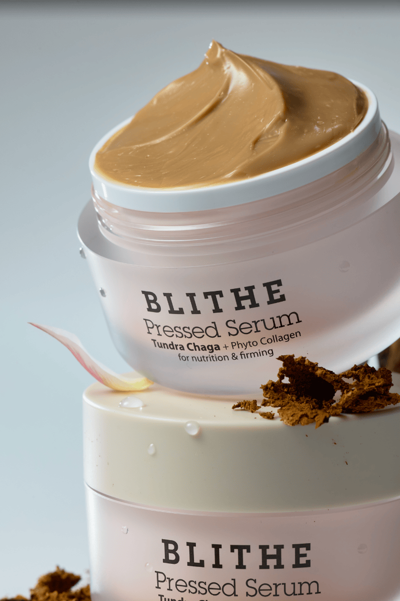 four Blithe Cosmetics skincare products on a beige surface