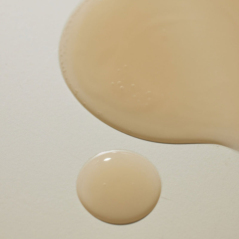 Close-up texture of Blithe Targeted Blemish Serum with Niacinamide 5.0, highlighting its smooth consistency for skincare.