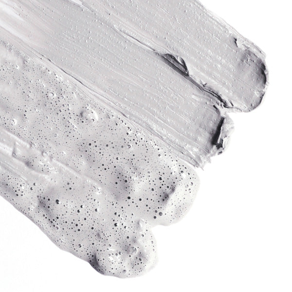 gray bubbling splash mask on a white