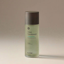 a green VItal Treatment bottle against a beige background