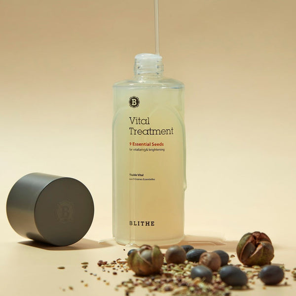 a Vital Treatment skincare bottle with seeds in the foreground