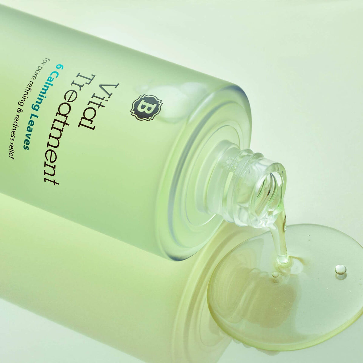 a Vital Treatment bottle spilling onto a surface