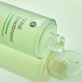 a Vital Treatment bottle spilling onto a surface